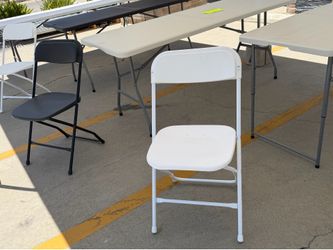 Box of 10 new white plastic chairs