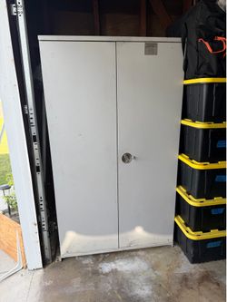 Locking cabinet with key