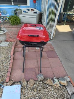 Red charcoal grill