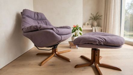 Mid-century swivel leather chair and matching ottoman