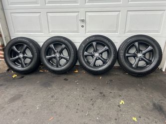 15” LIKE NEW (5/114) Rims and tires.