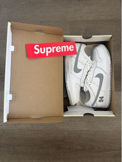Supreme X Nike Dunk Low SB “White Metallic Silver”