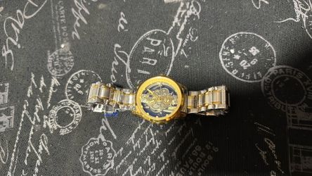 Dual gold and stainless skeleton design brand new men’s watch