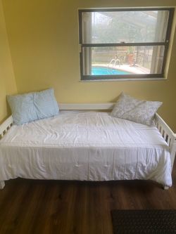 Twin bed with mattress