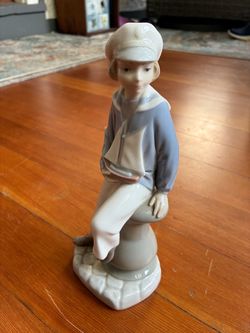 Lladró Boy with Sailboat Porcelain Figurine