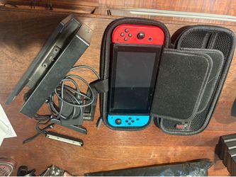 Nintendo Switch with controller ,game power and AV chords