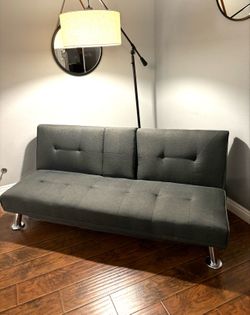 Small couch/futon folds down to bed-$50