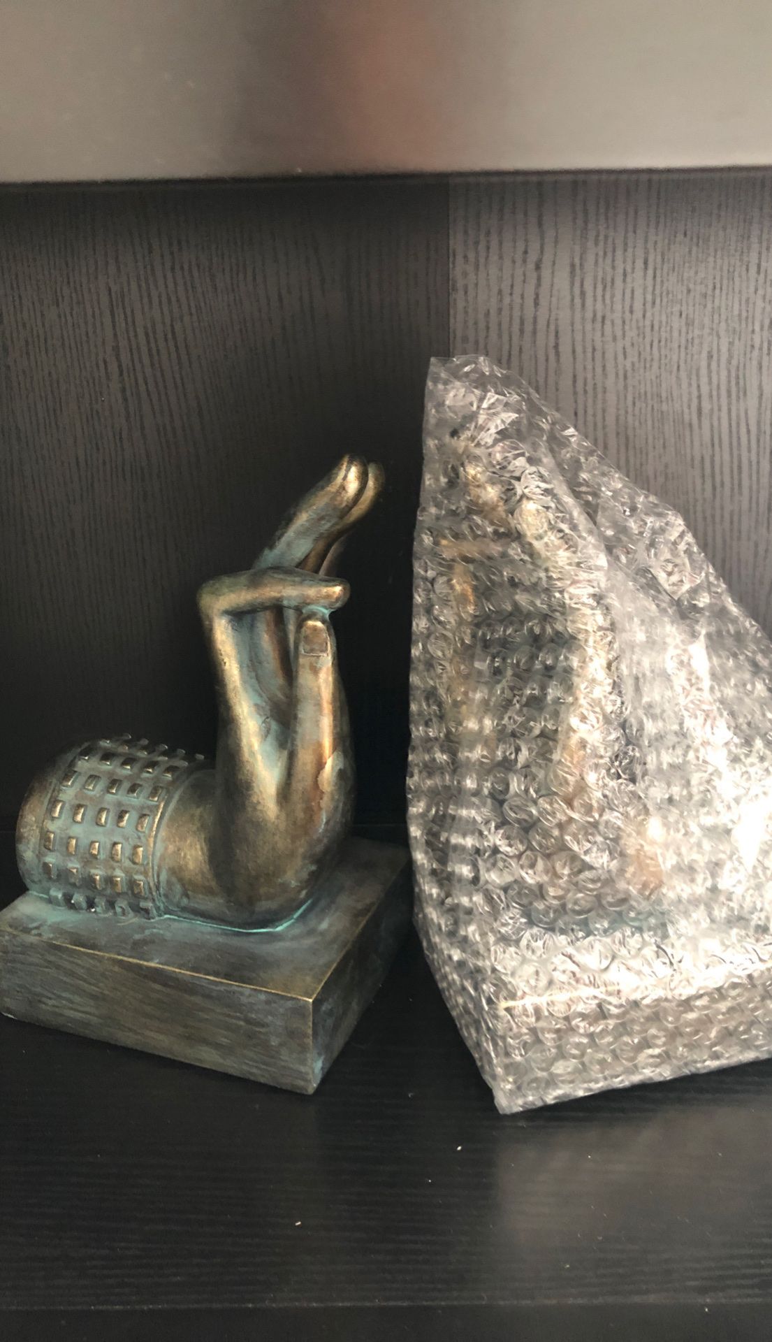 Asian-themed, book ends, hands