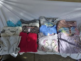12 girls size 10/12 & 14/16 sweaters 
Pick up Powers and Constitution area 