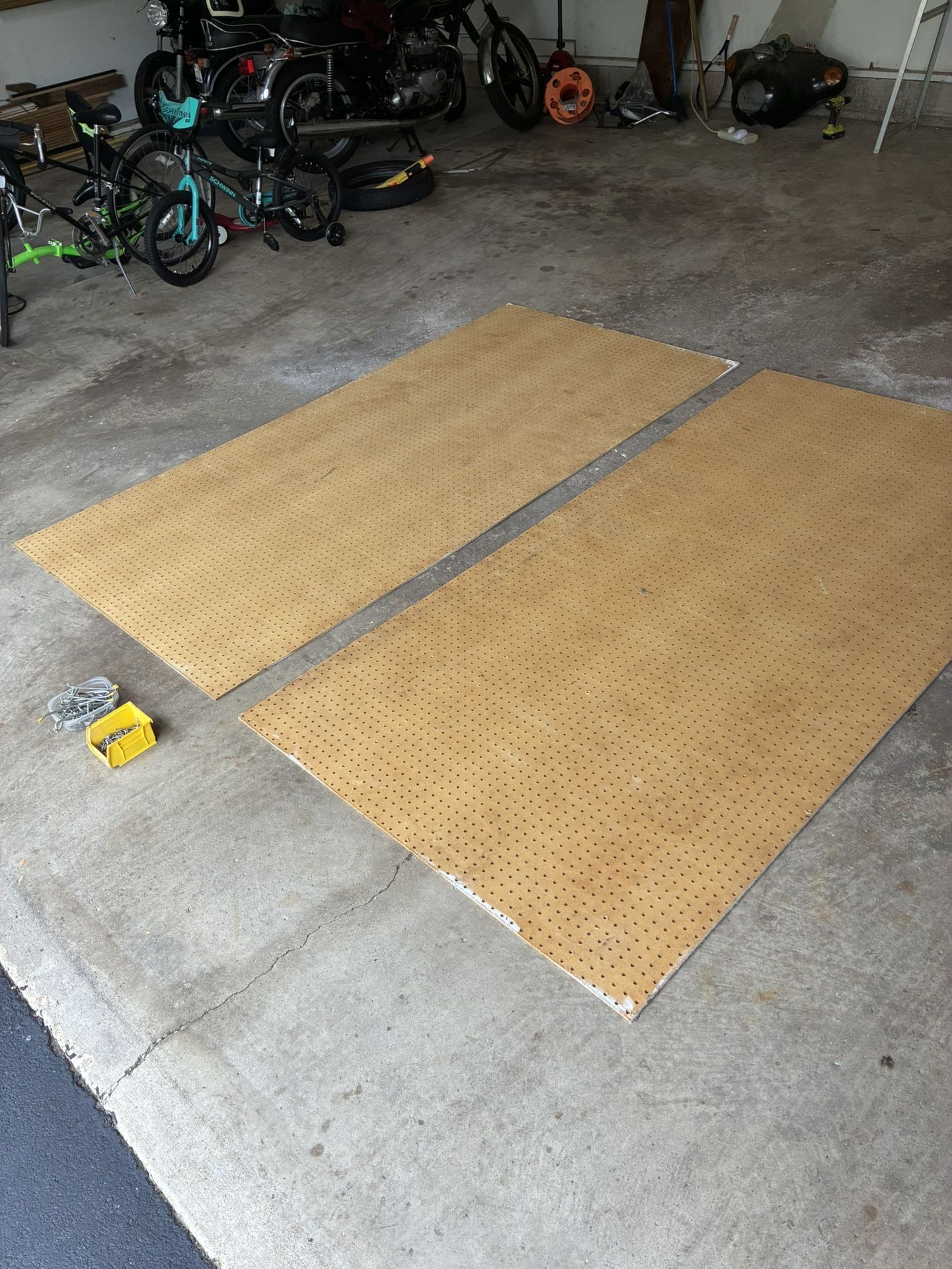 2 large pegboards with hooks