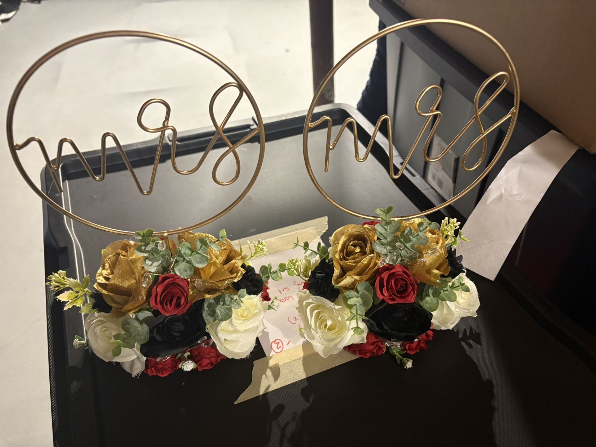 Mrs And Mrs Stands With Flowers