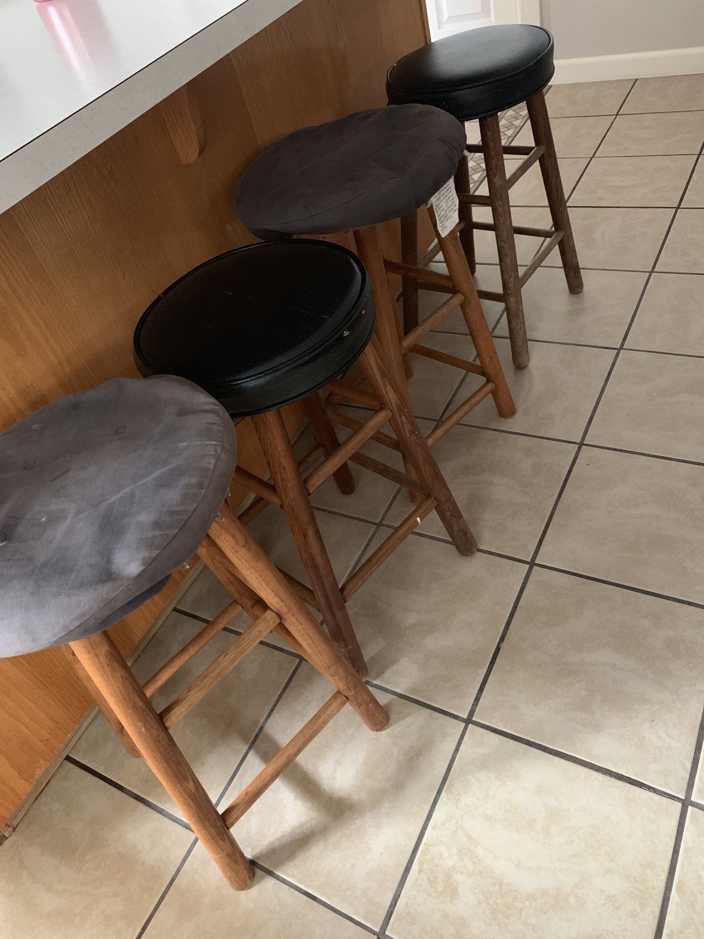 4 used stools. $10 all 4. Tiny splash paint on them. 2 are leather still good. Can use a little cleaning. I can do 20 on the table or best offer.