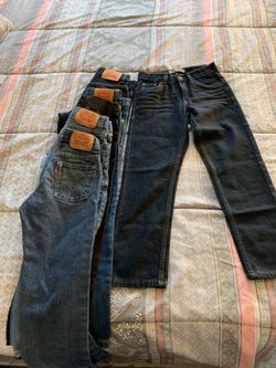 6 brand new Levi’s. Size 7. For kids