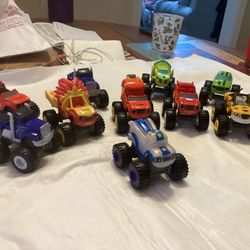 10 NEW MONSTER TRUCKS-$3.00/car