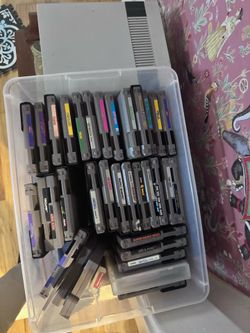 NES with about 30 games 2 controllers cleaner