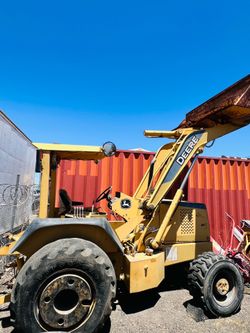 John Deere 210LE 4x4 Skip Loader read ad