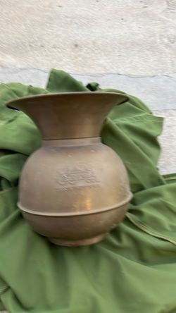 Vintage brass solution with Union Pacific Railroad insignia on it.