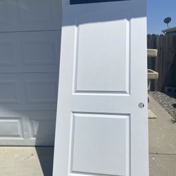 “New” 36 Inch X 80 Inch Two Panel Door $75