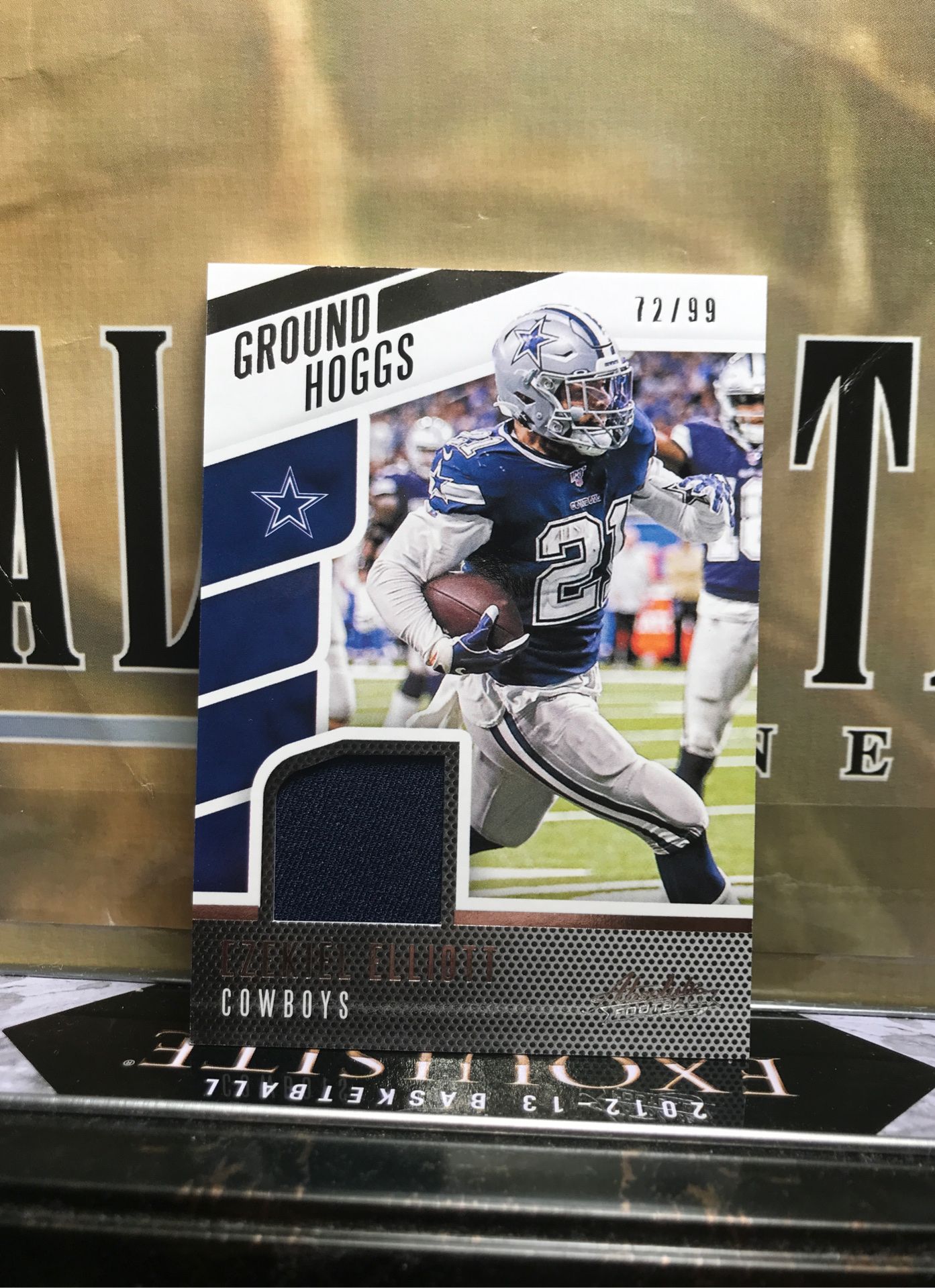 EZEKIEL ELLIOTT SP /99 GROUND HOGGS RELIC COWBOYS AS SHOWN