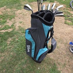 Golf bag with clubs