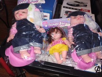 Two big doll and one small