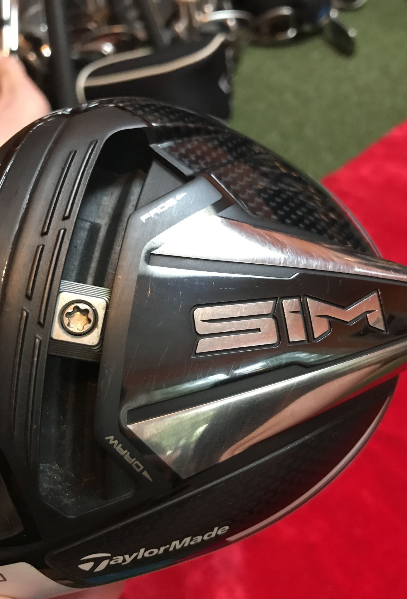Left handed TaylorMade. Sims driver head. Golf clubs