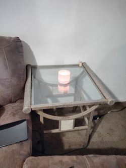 2 glass end tables