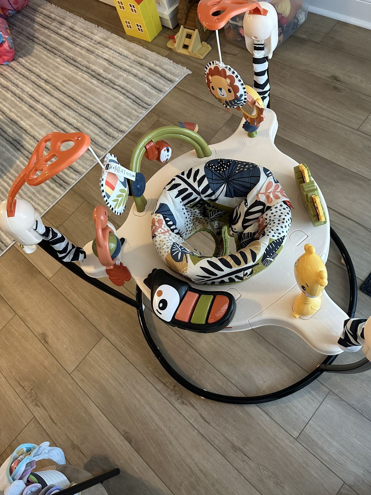 Fisher-Price Baby Bouncer Palm Paradise Jumperoo Activity Center with Music Lights Sounds and Developmental Toys