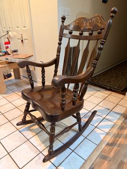 Antique brown rocking chair