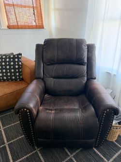Free brown leather remote recliner