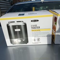 Bella 2 Slice self-centering toaster. Brand new in the box. $20.. free local delivery. 