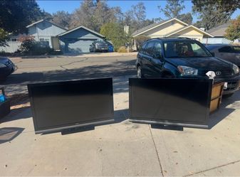 Two Vizio Flat Screen TVs