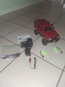 Wpl off road rc crawler with working head lights comes with everything for it firm price $45