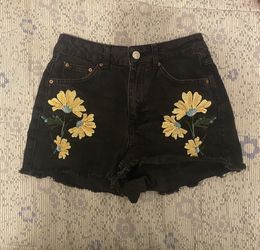Embroidered black denim shorts