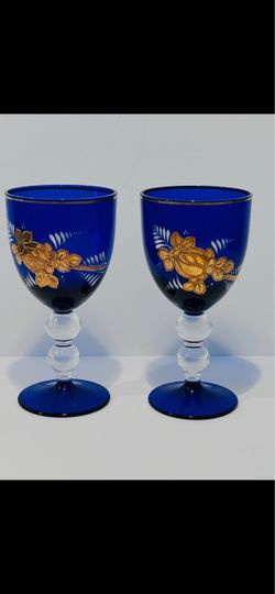 Vintage Bohemia Czech Art Glass Hand Painted Cobalt 2 Wine Glasses 6.25”.  Wet rare Bohemia Hand painted cobalt glass with Gilded flowers wine goblets