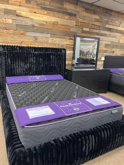 Luxurious plush corduroy upholstered bed features wireless speakers & charger