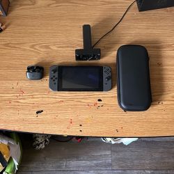 Nintendo Switch Set With Jbl Airpods a charging station for the joy cons and store your Nintendo switch