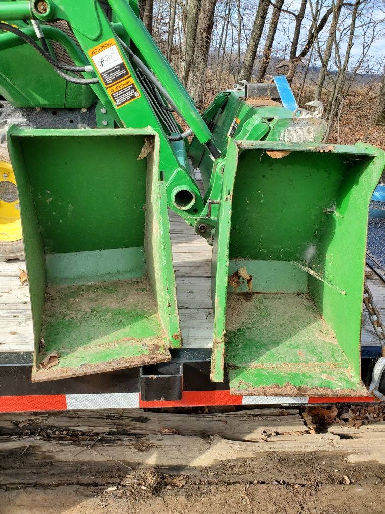 Loader bucket extenders.