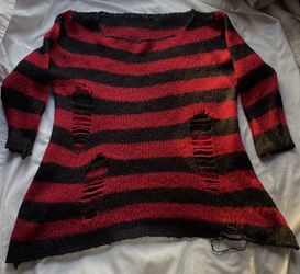 Kurt cobain looking sweater *DISCLAIMER* but he never owned it