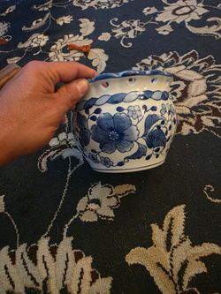 Vintage blue and white planter with heart cutouts