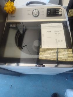 Maytag 5.3 cubic capacity high efficiency smart top load washer with extra power button