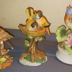 vintage Of Three porcelain bird figurines on floral branches
