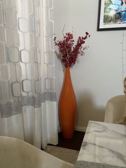Big orange vase WITH flowers