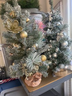 Small Christmas trees. , decoration, ribbons, ornaments $5-25