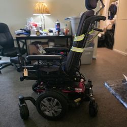 Quantum Rehab J4 electric power wheelchair for sale.