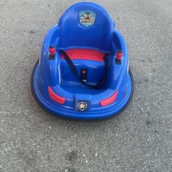 Patrol 6V Bumper Car by Flybar, an electric ride-on toy for toddlers. NO charger. Lost. Used in good condition with minor cosmetic blemishes associate