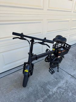 Used like New Black Folding Electric Bike with Rear Basket