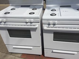 Like new gas stove with warranty