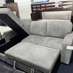 Light Grey Reversible Sectional Sleeper W/ Storage