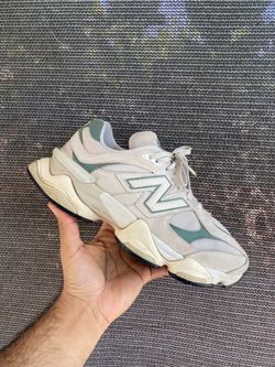 New Balance 9060 silhouette in an off-white and green